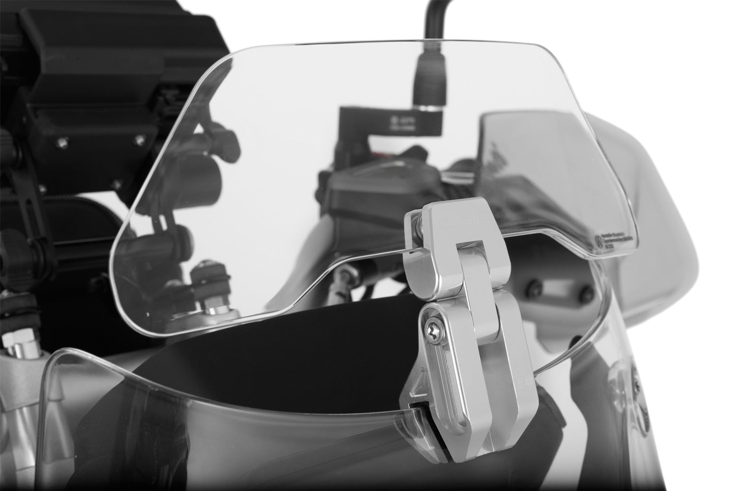 The transparent Wunderlich windshield extension for motorcycle and motorcycles, windshield extension protects against wind, airstream