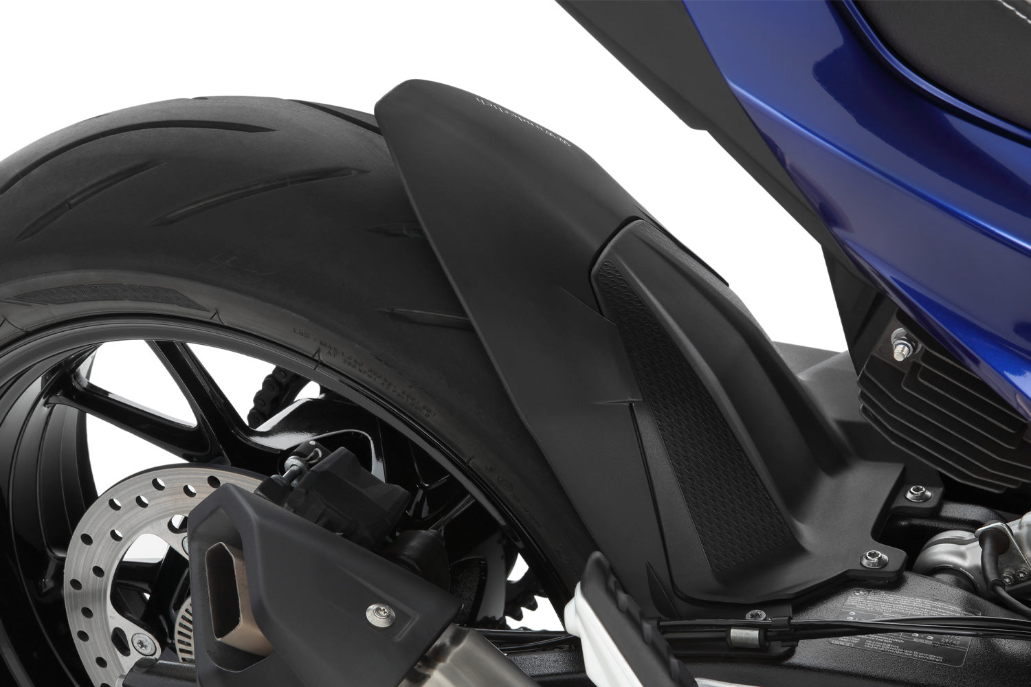 The area around the swing arm pivot, the swing arm, the collector, the gears and the shock absorber are in front of the rear wheel and thus