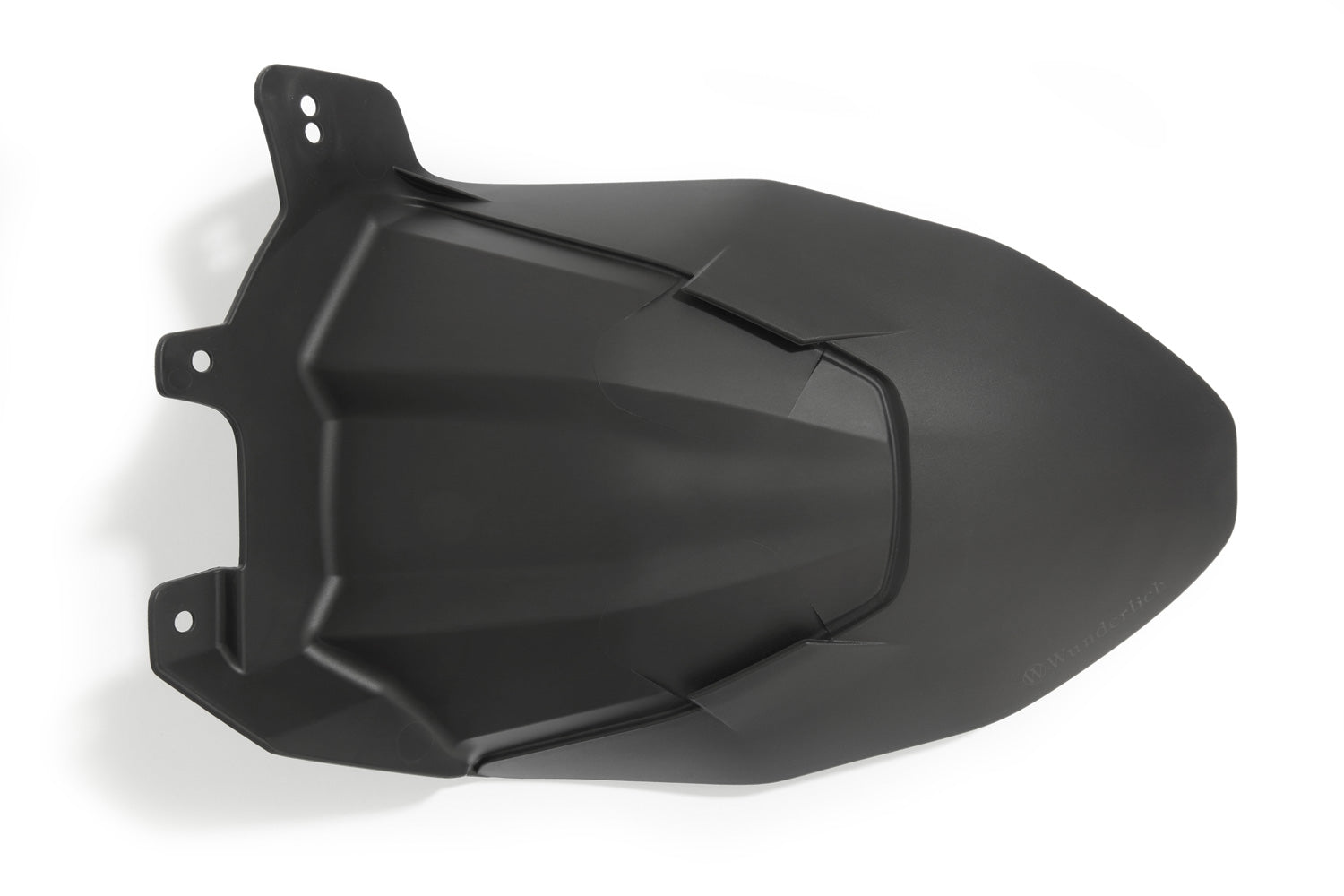 The area around the swing arm pivot, the swing arm, the collector, the gears and the shock absorber are in front of the rear wheel and thus