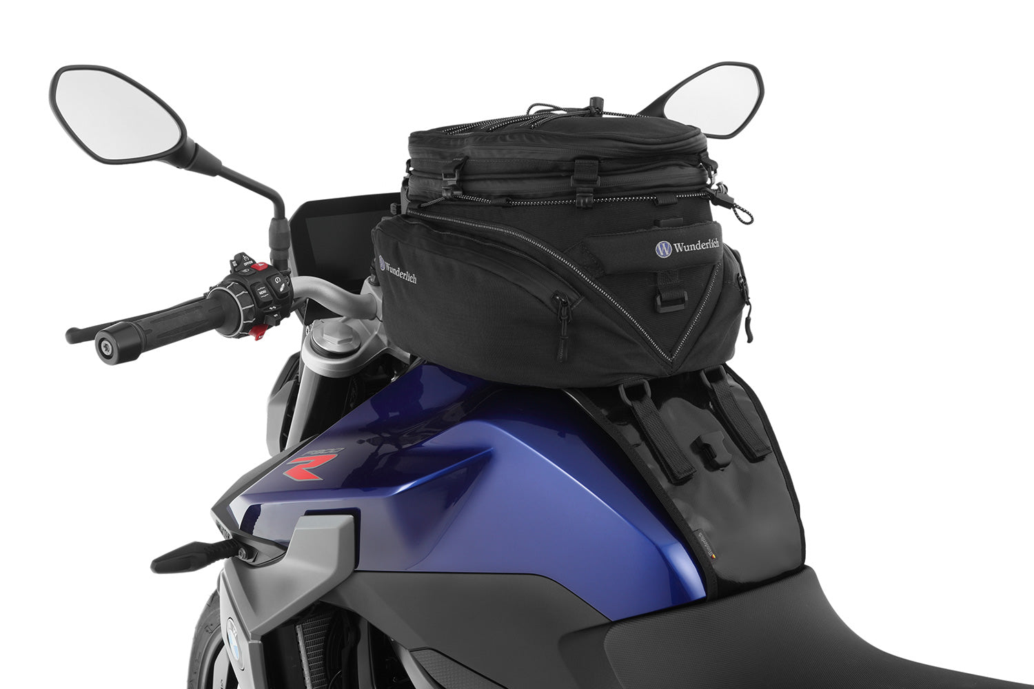 The mounting system is attached to the vehicle with minimal hand pressure and the tank bag can be quickly fastened to it.
