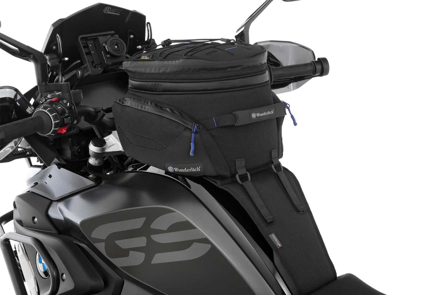 The mounting system is attached to the vehicle with minimal hand pressure and the tank bag can be quickly fastened to it.