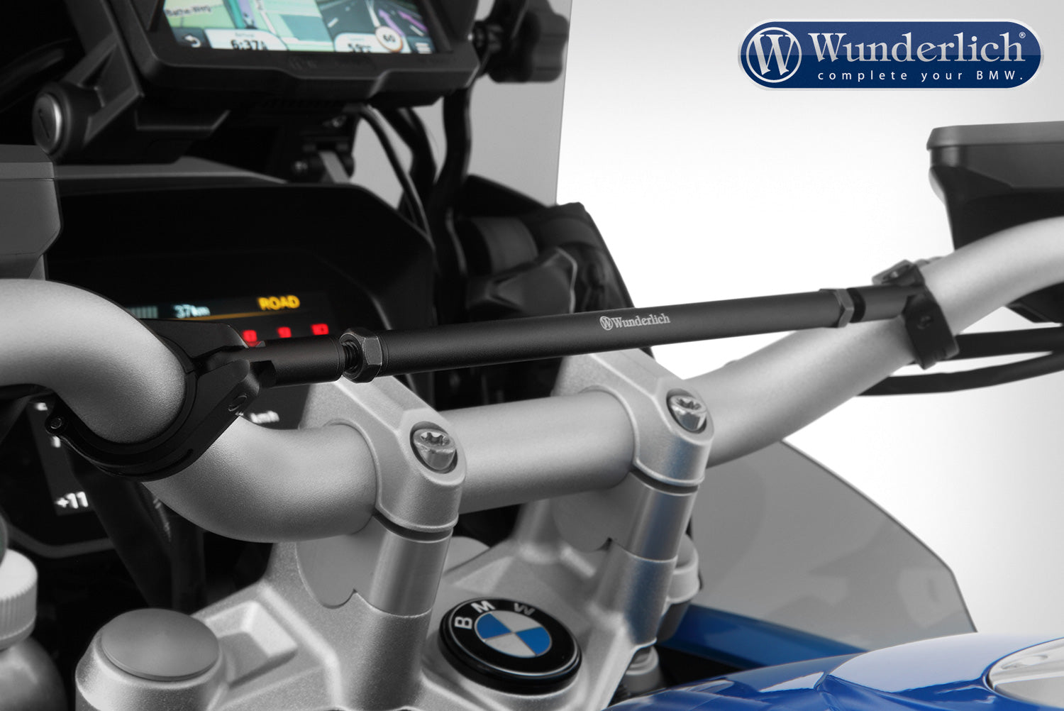 This high-quality black handlebar central support from Wunderlich made of aluminium is 300 mm long with a diameter of 12 mm.