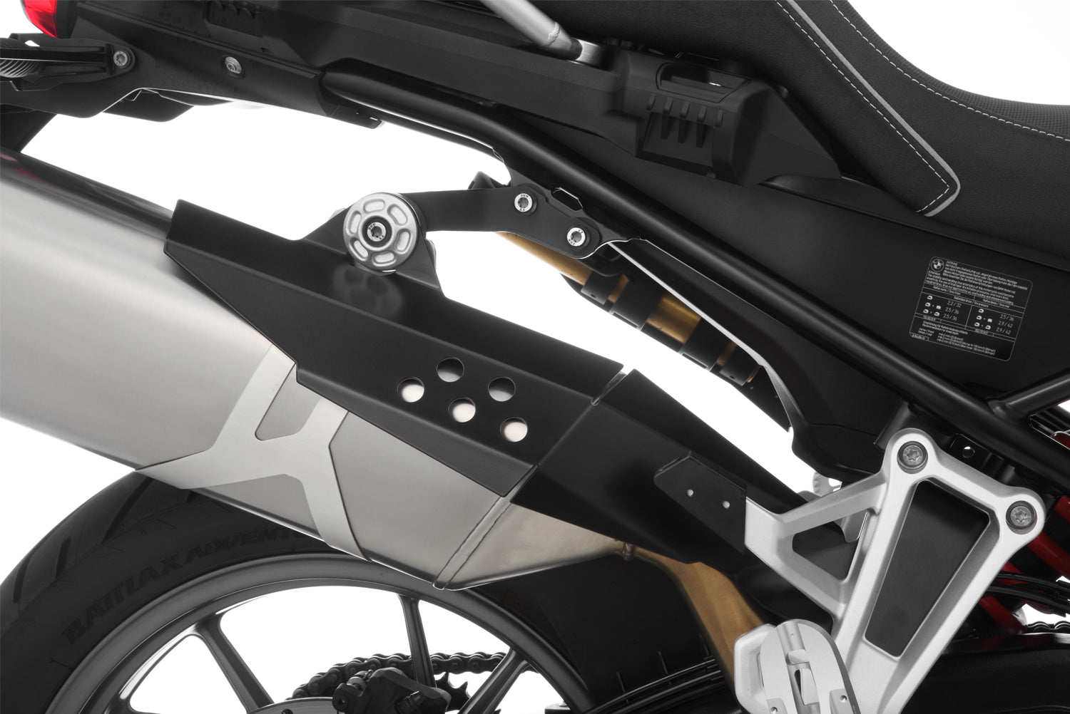 Covers the front of the rear silencer and thereby protects exposed areas against painful contact and burns.