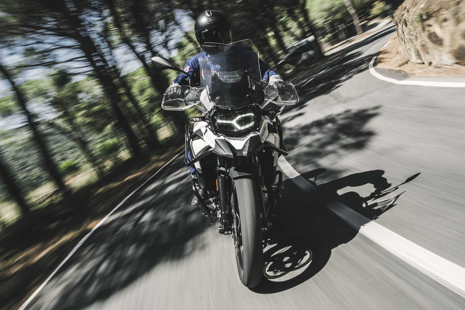 Covers the front of the rear silencer and thereby protects exposed areas against painful contact and burns.