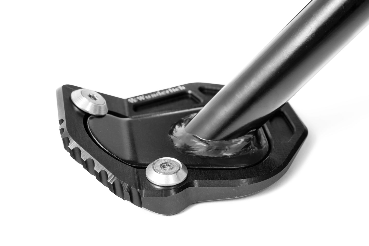 A precisely machined extension plate that can quickly be bolted to the side stand eliminates this risk.