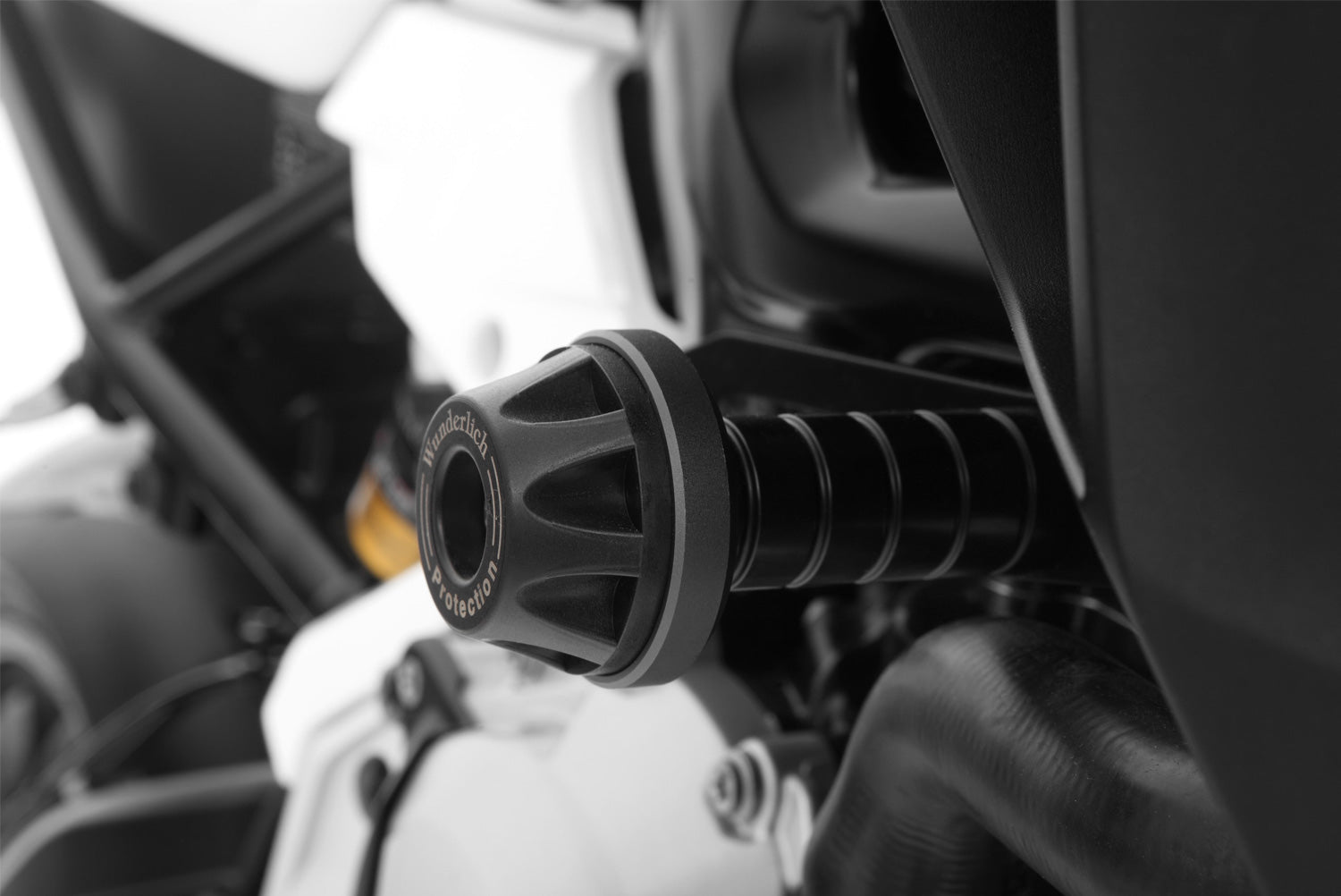 Effective protection for engine, frame and faring with a discreet look
