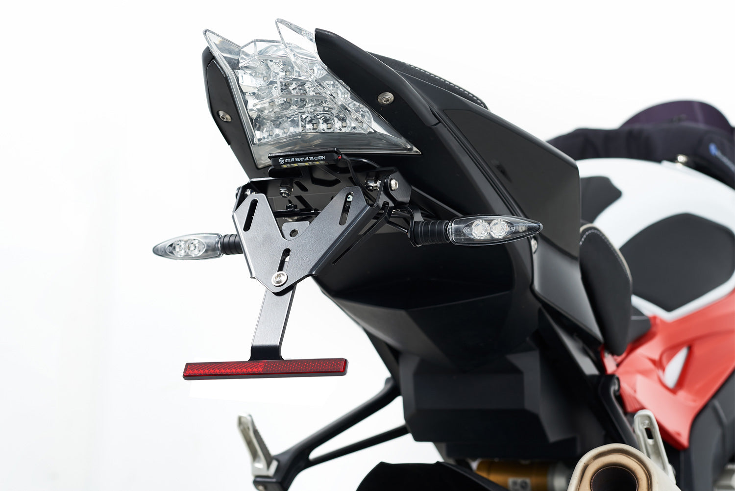 Fully adjustable number plate carrier for the S 1000 RR. The carrier can be adjusted in terms of tilt and proximity to the rear wheel