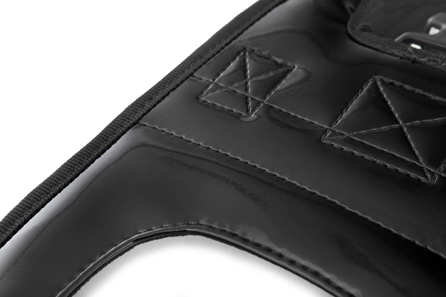 The mounting system is attached to the vehicle with minimal hand pressure and the tank bag can be quickly fastened to it.
