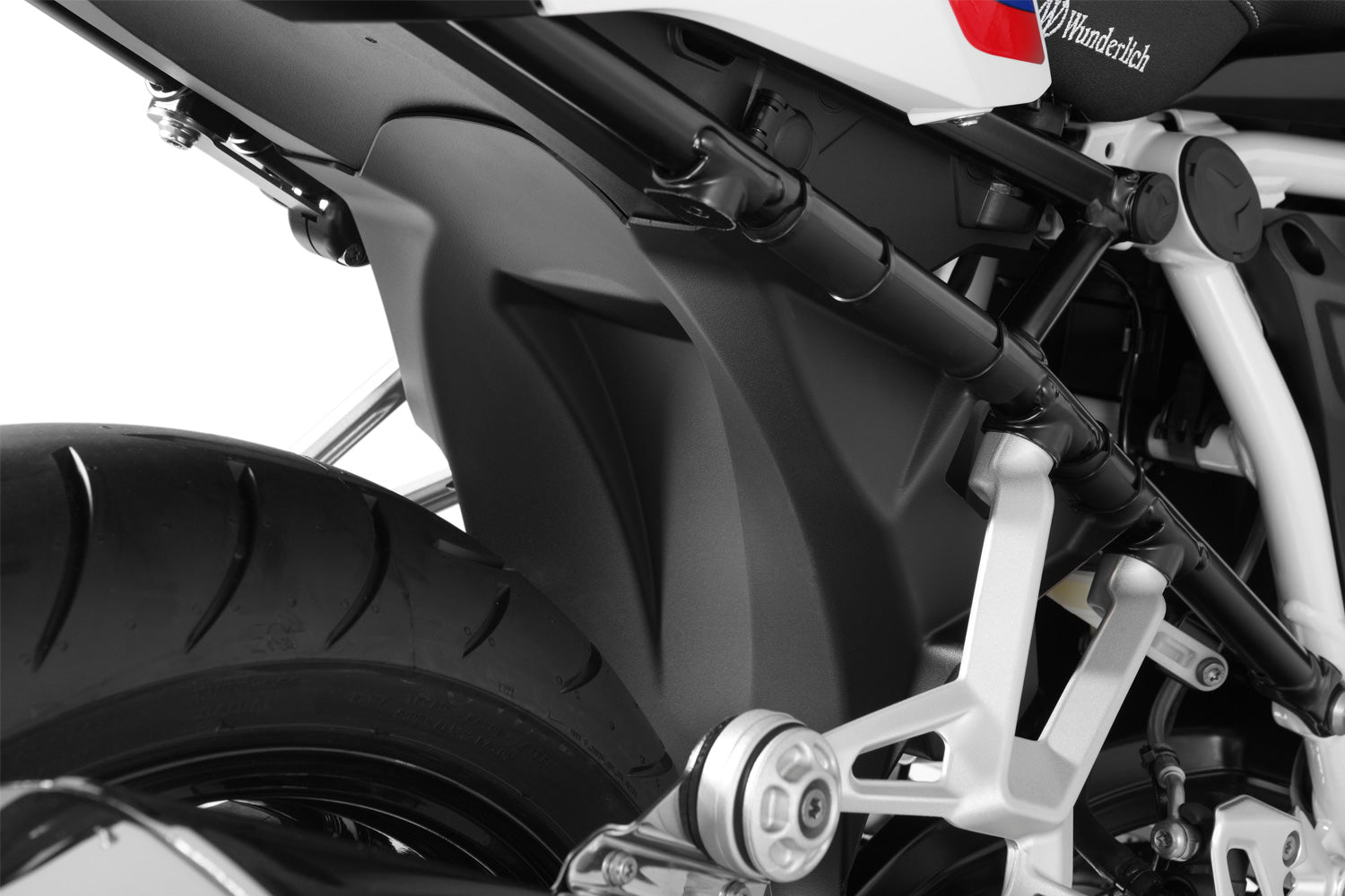This splash guard protects the shock, along with shock mounts, swing arm, collector pipes and rear of the gearbox of the R 1200 RS LC.
