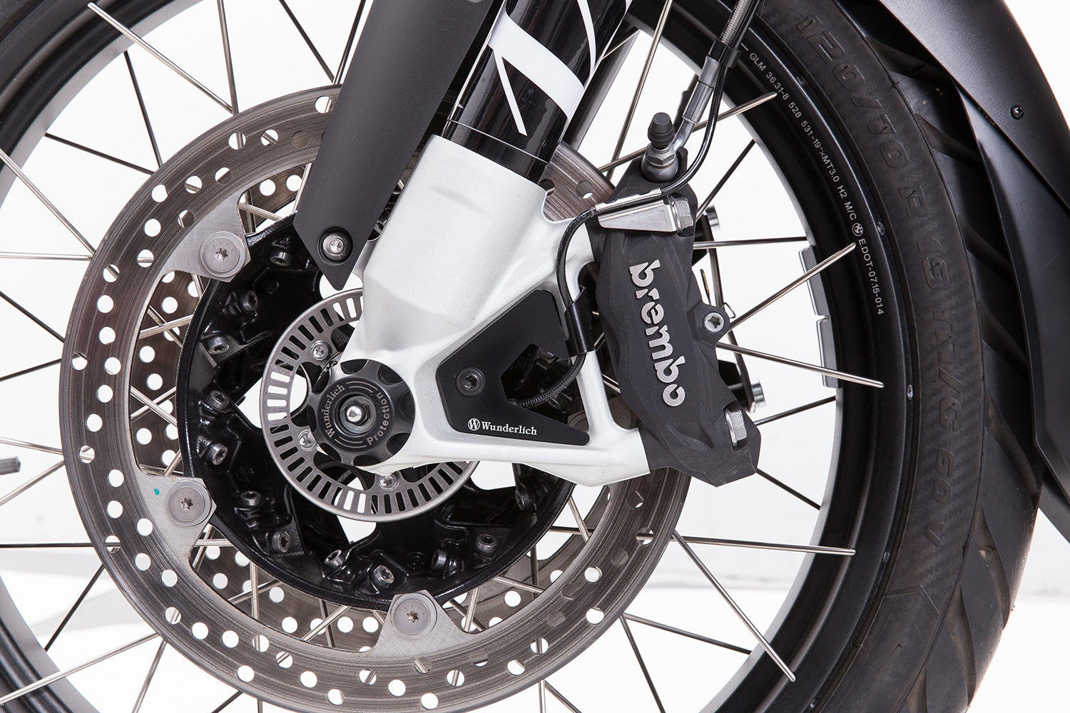 Wunderlich ABS sensor protection; this ABS sensor cover closes the gaps between the brake calliper and front wheel bearings.