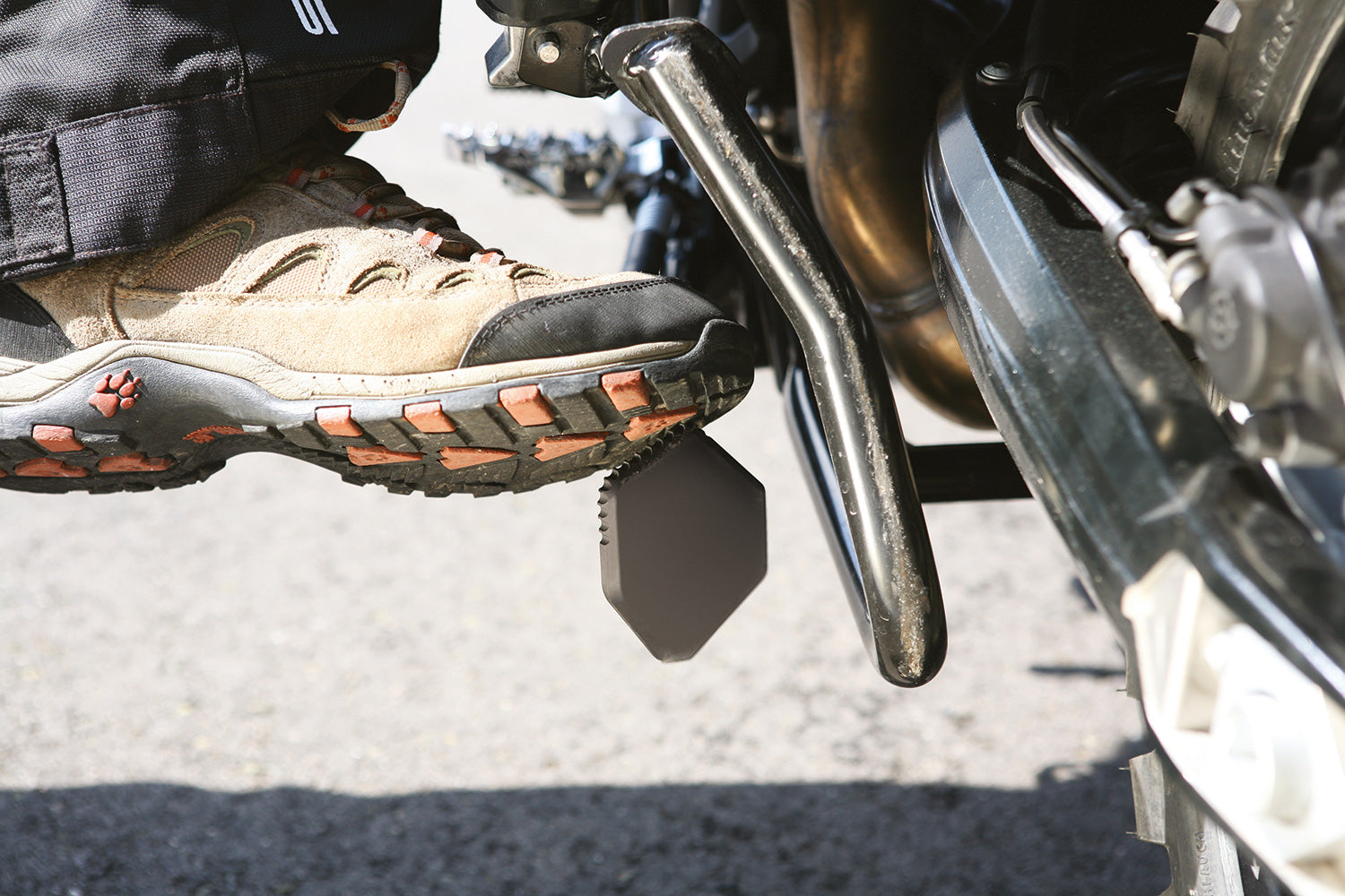 A precisely machined extension plate that can quickly be bolted to the side stand eliminates this risk.