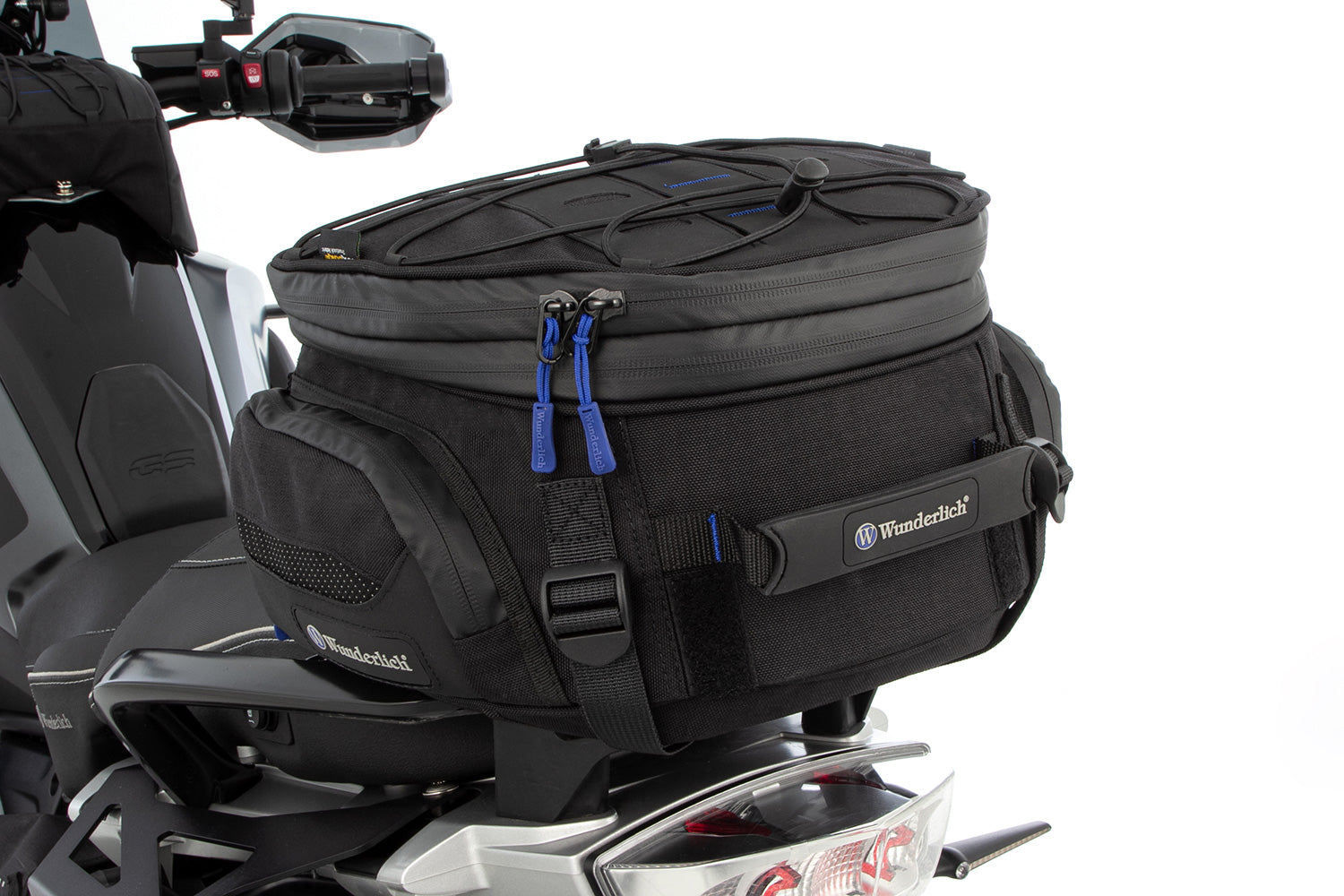 Multifunctional compact bag for the seat or luggage carrier