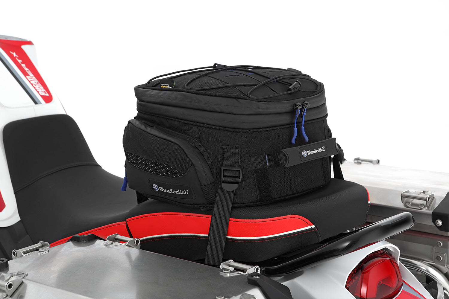 Multifunctional compact bag for the seat or luggage carrier