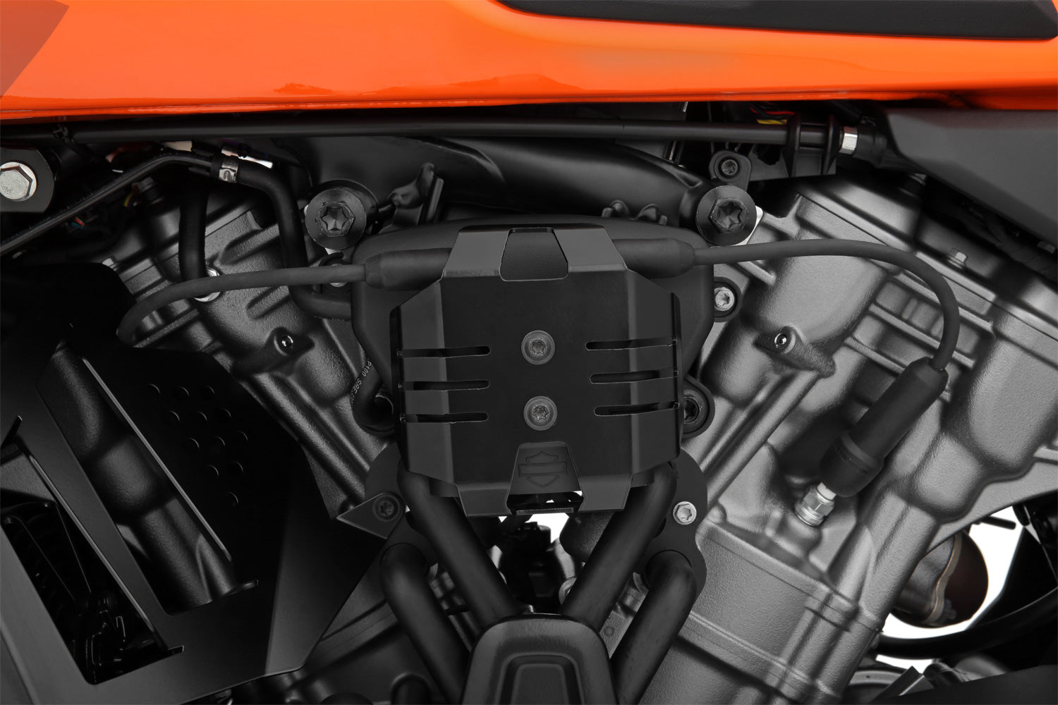 Covers the ignition coil and integrates the area perfectly into the overall design of the motorcycle