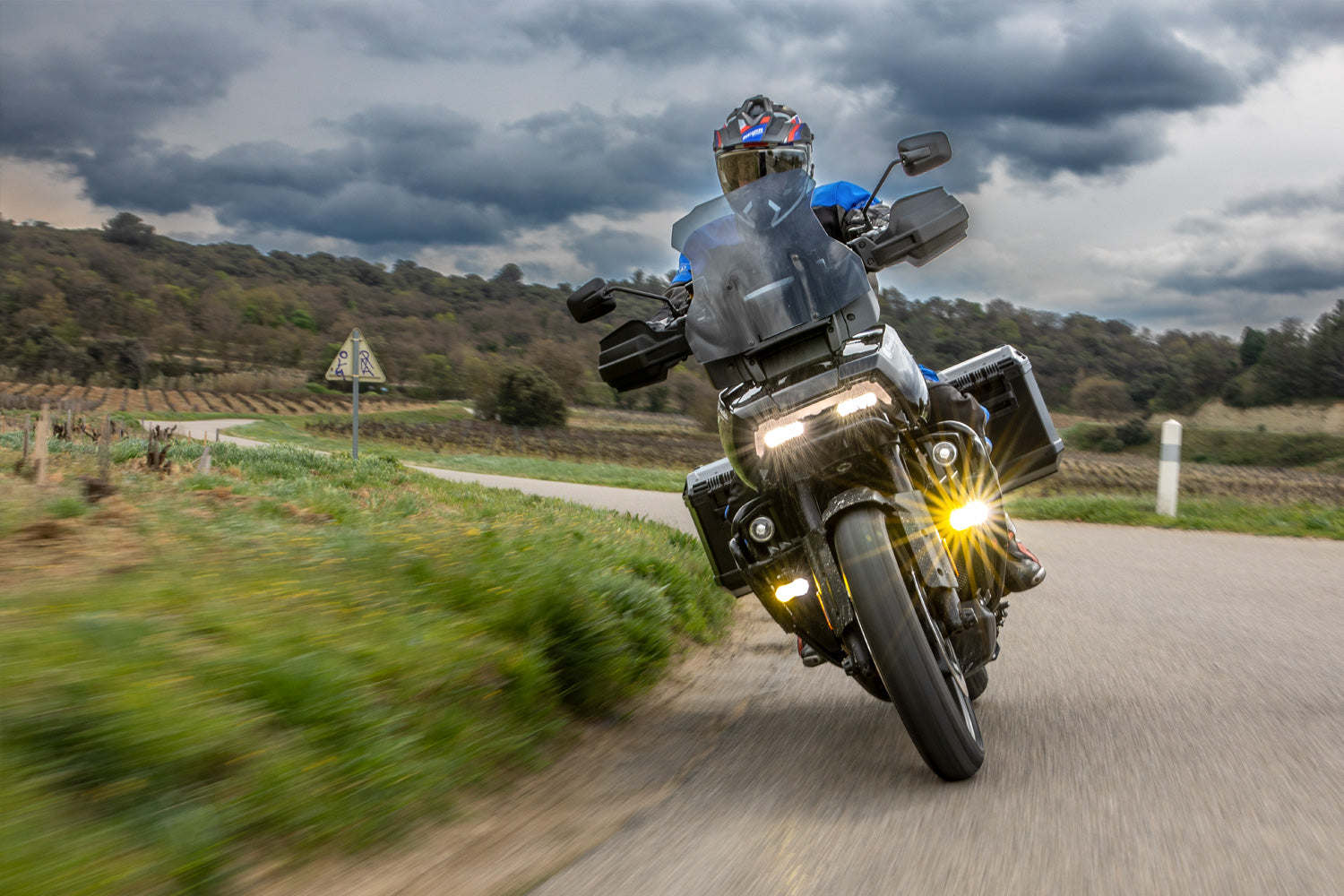 Reliably protects pillion rider's legs and feet from swirling spray and road debris on rainy rides, increasing comfort