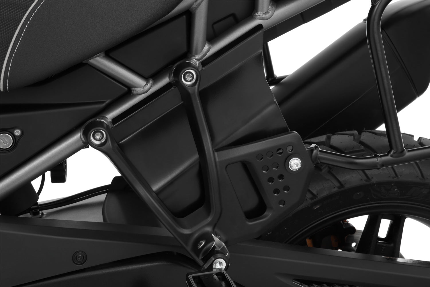 Reliably protects pillion rider's legs and feet from swirling spray and road debris on rainy rides, increasing comfort