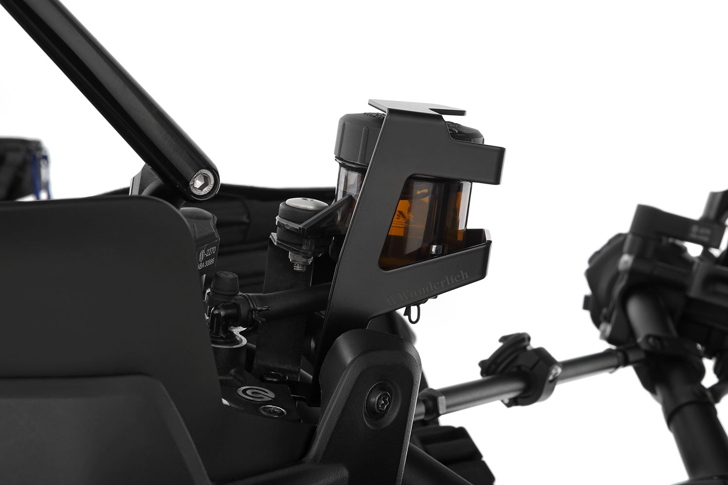 Discreetly integrated protective cover for the front brake fluid reservoir