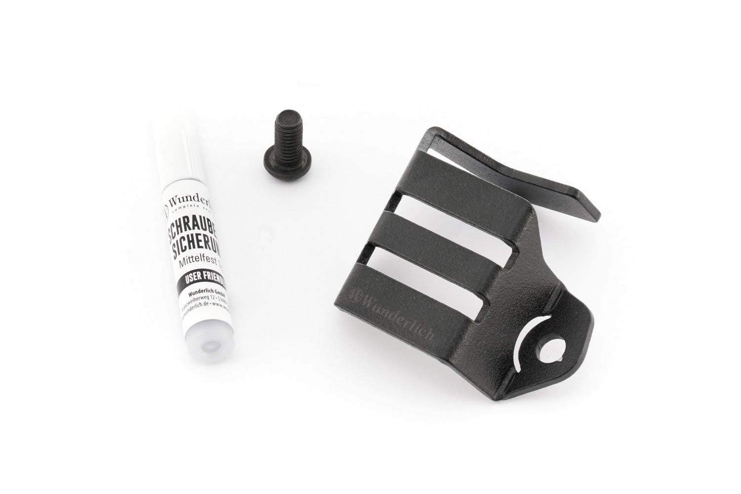 Discreetly integrated protective cover for the rear wheel brake fluid reservoir