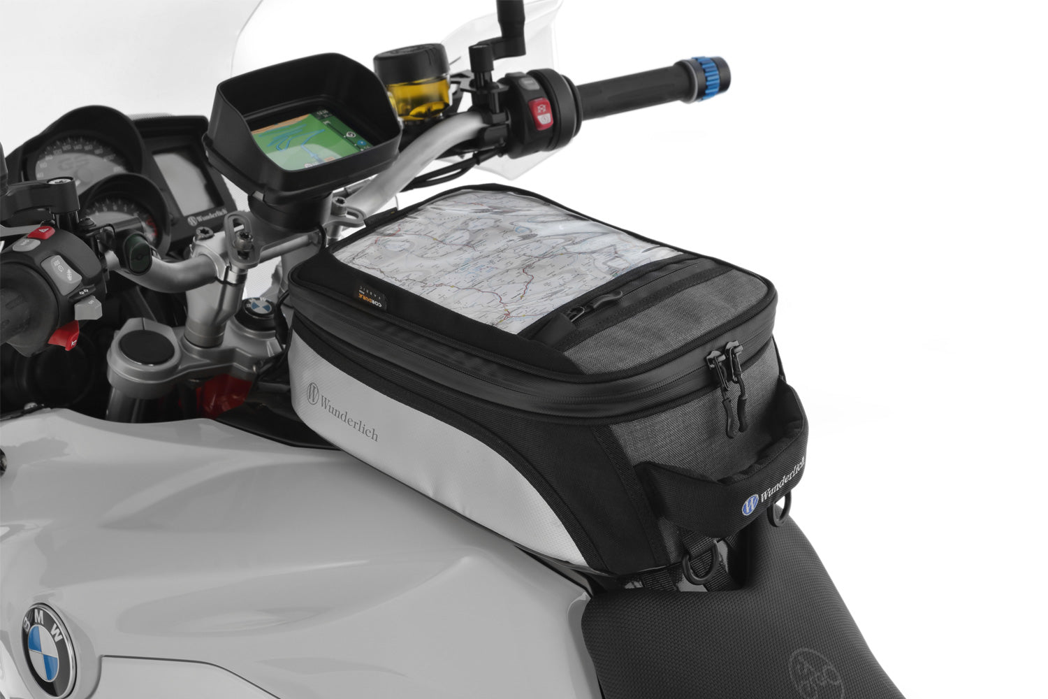The mounting system is attached to the vehicle with minimal hand pressure and the tank bag can be quickly fastened to it. 