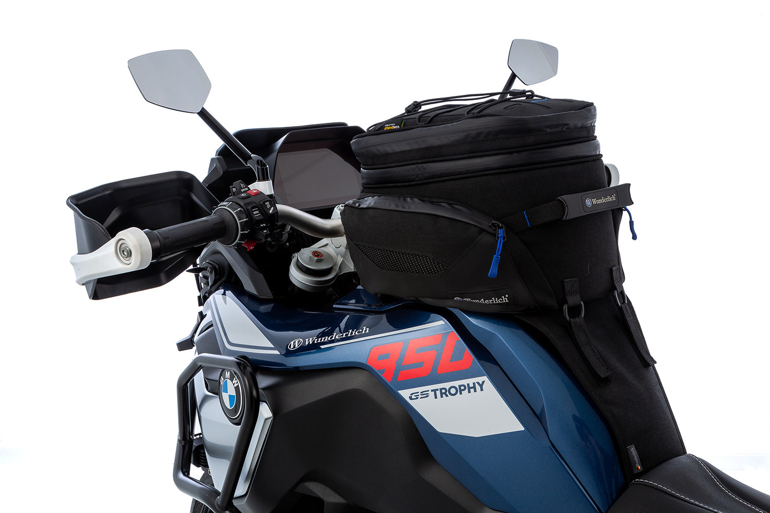 The mounting system is attached to the vehicle with minimal hand pressure and the tank bag can be quickly fastened to it. 