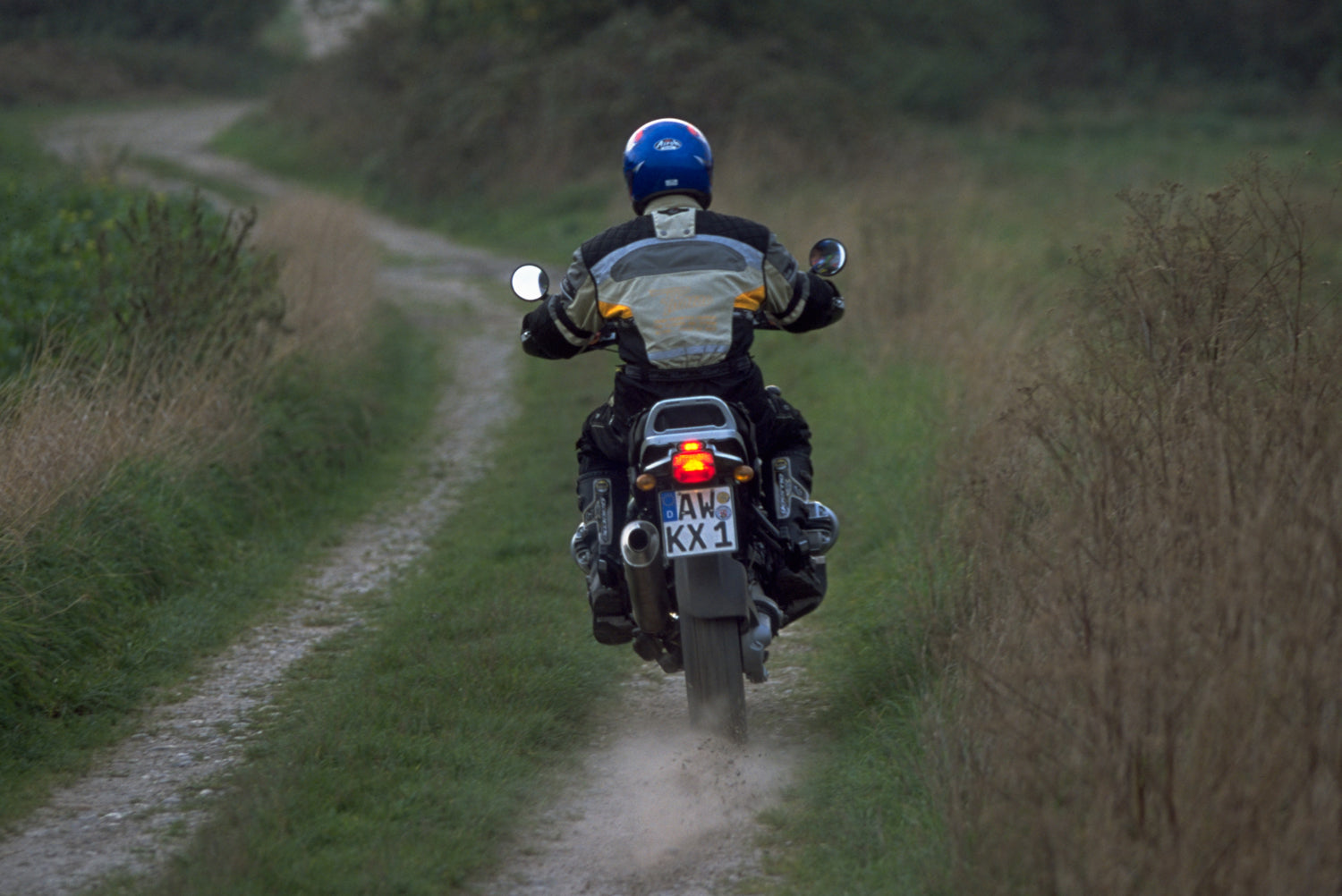 The mounting system is attached to the vehicle with minimal hand pressure and the tank bag can be quickly fastened to it. 