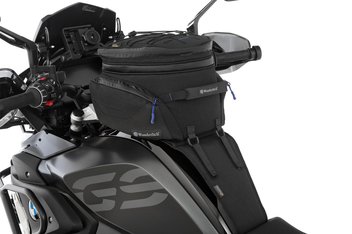The mounting system is attached to the vehicle with minimal hand pressure and the tank bag can be quickly fastened to it.