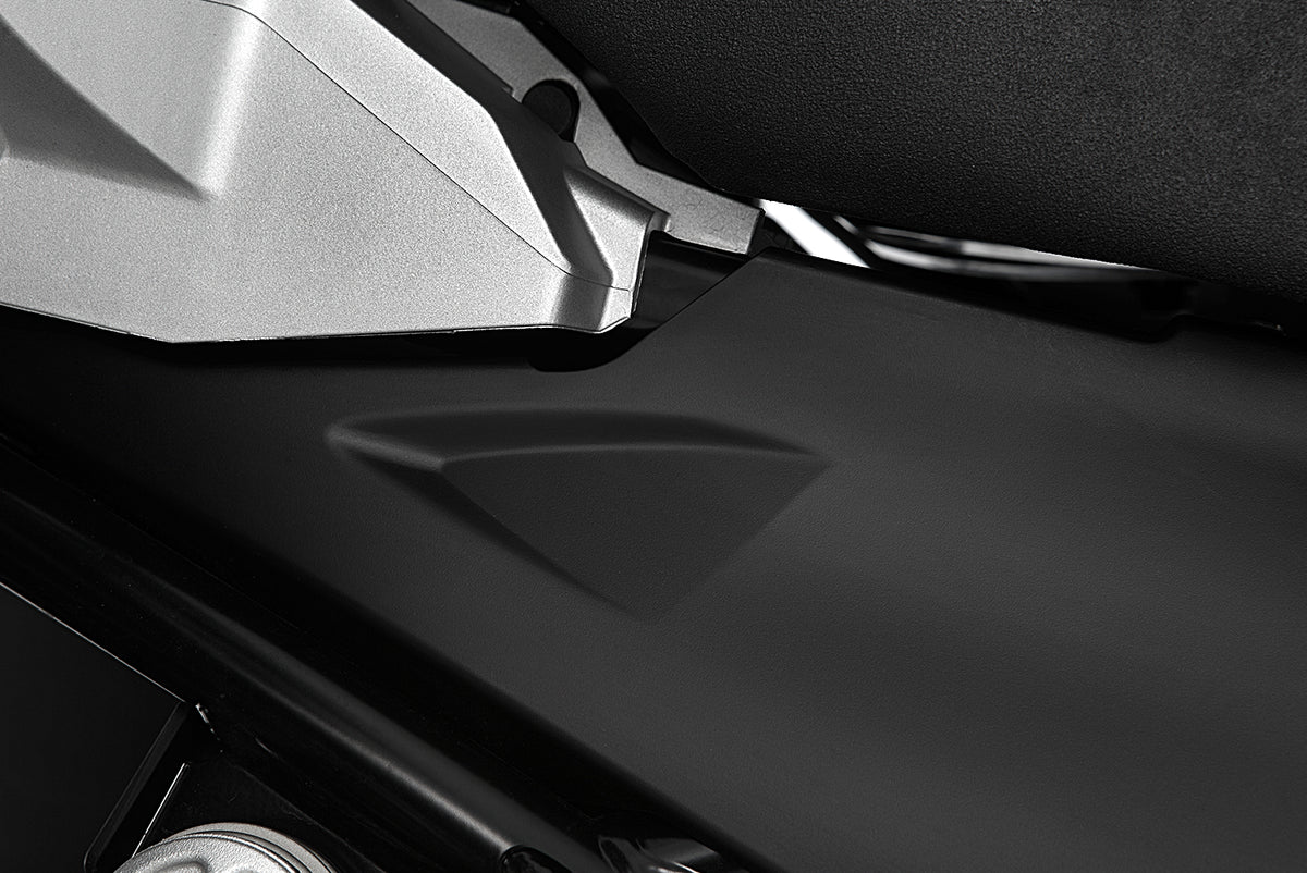 The two halves of the cover perfectly enclose the two side openings on the rear of the frame