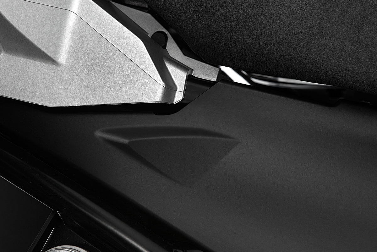 The two halves of the cover perfectly enclose the two side openings on the rear of the frame
