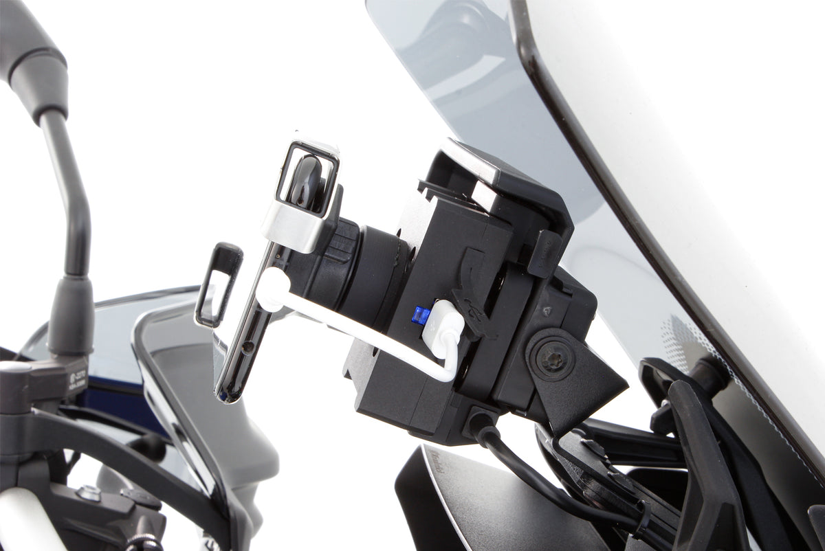 Our thoroughly practical USB charging box  fits all BMWs with the factory-side BMW navigation preparation (Navigator V,  VI).