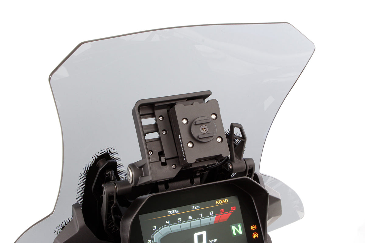 Our thoroughly practical USB charging box  fits all BMWs with the factory-side BMW navigation preparation (Navigator V,  VI).