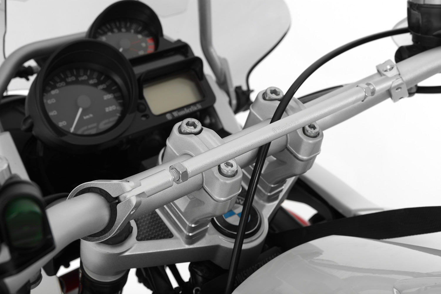 This high-quality black handlebar central support from Wunderlich made of aluminium is 300 mm long with a diameter of 12 mm.