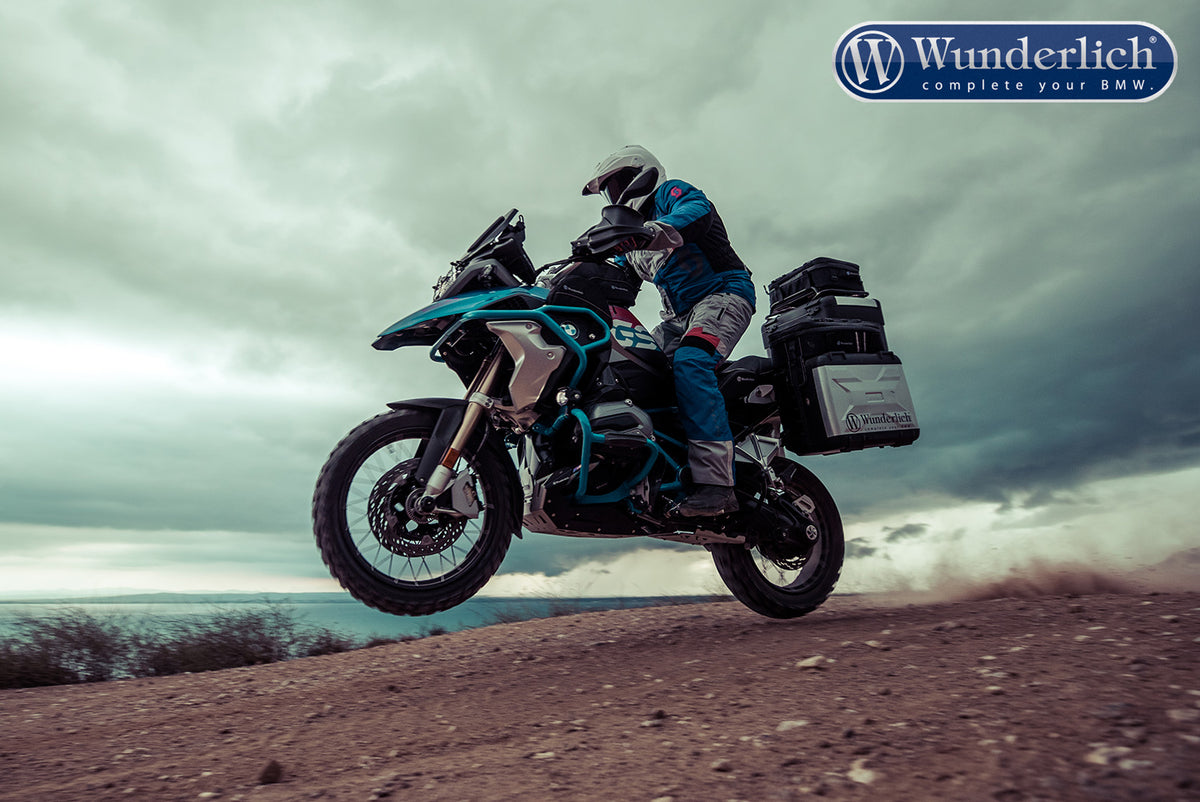 This high-quality black handlebar central support from Wunderlich made of aluminium is 300 mm long with a diameter of 12 mm.