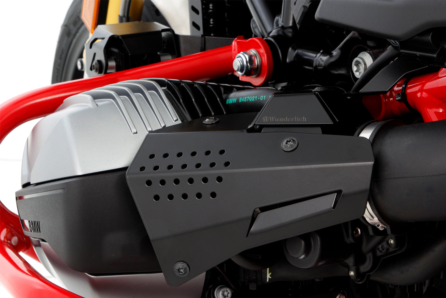 The cover of the fuel injection system protects the intake pipe area including the injector tube, line connections and throttle valve sensor