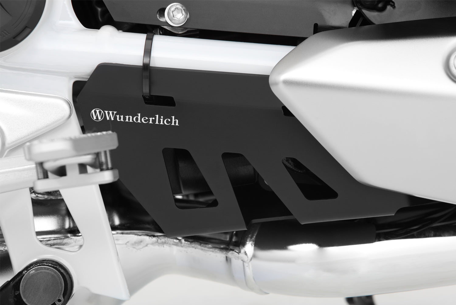 The Wunderlich exhaust flap control cover reliably protects the control flaps on the BMW R1200GS LC against damage