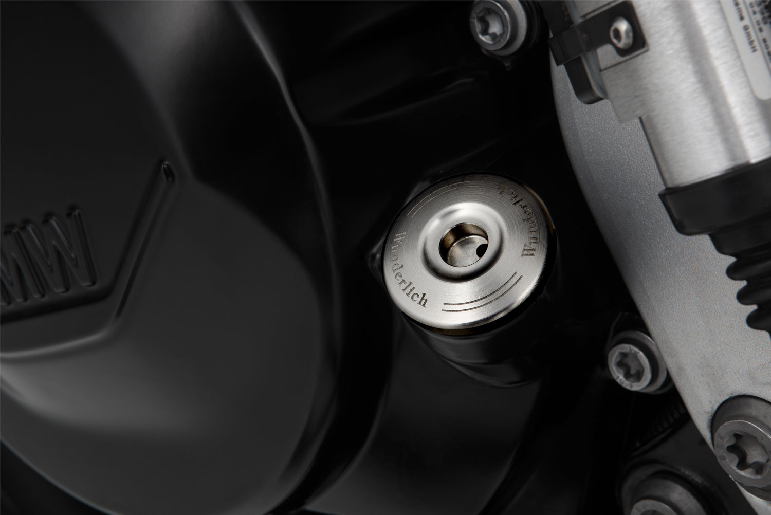 Lockable oil plug with discreet, single-piece design, with zero mechanism
