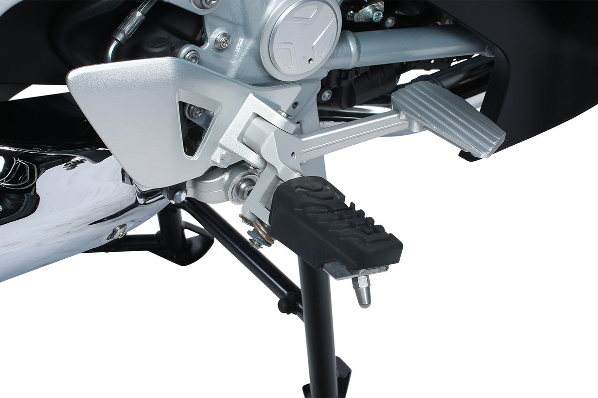 »ERGO« Footrest lowering for R1200RT offers a relaxed seating position and reduced the knee angle. Machined from solid aluminium.