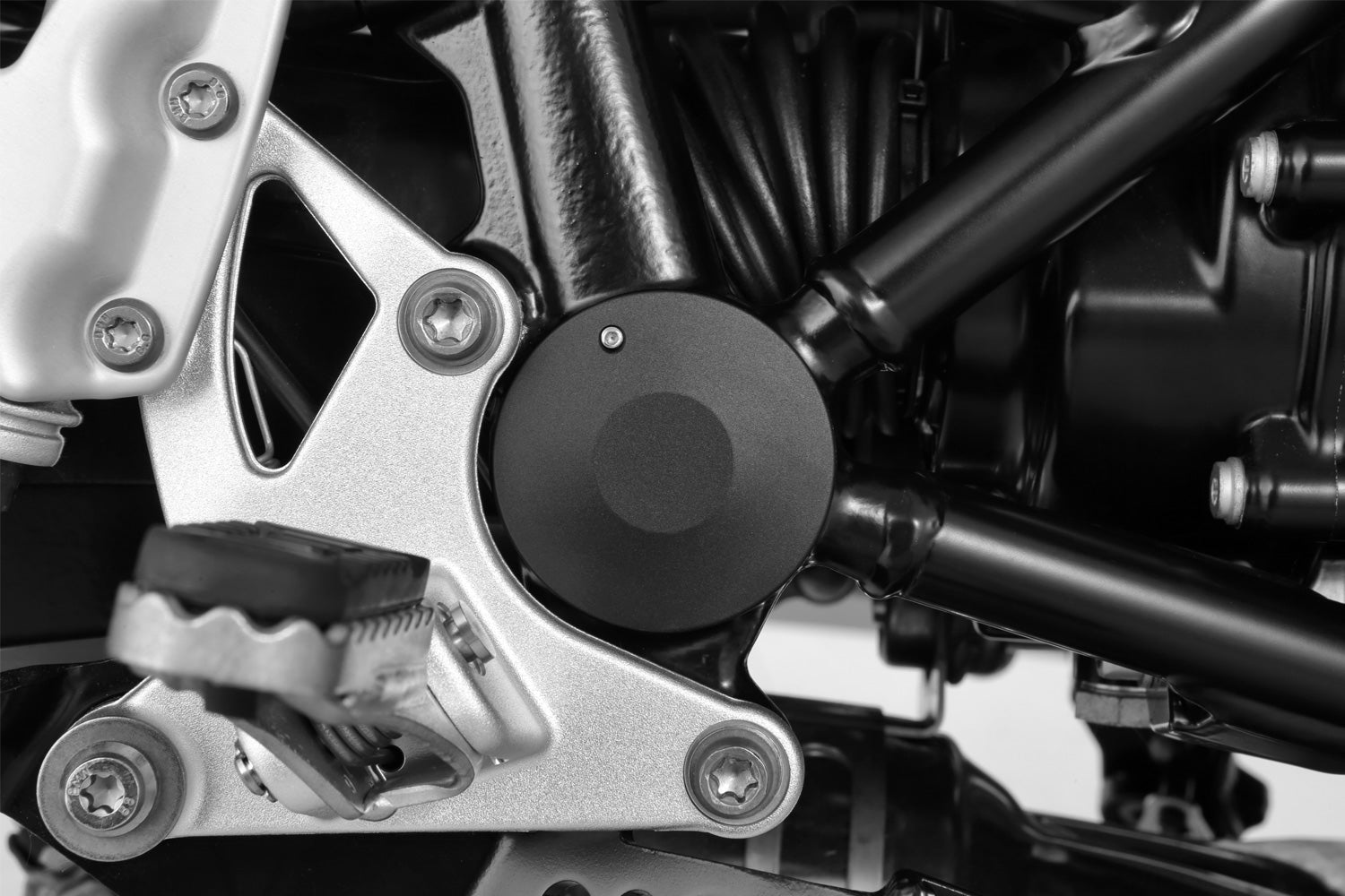 Wunderlich winged sealing cap for the BMW R 1200 R, beautiful covers for the large swing arm attachment holes.