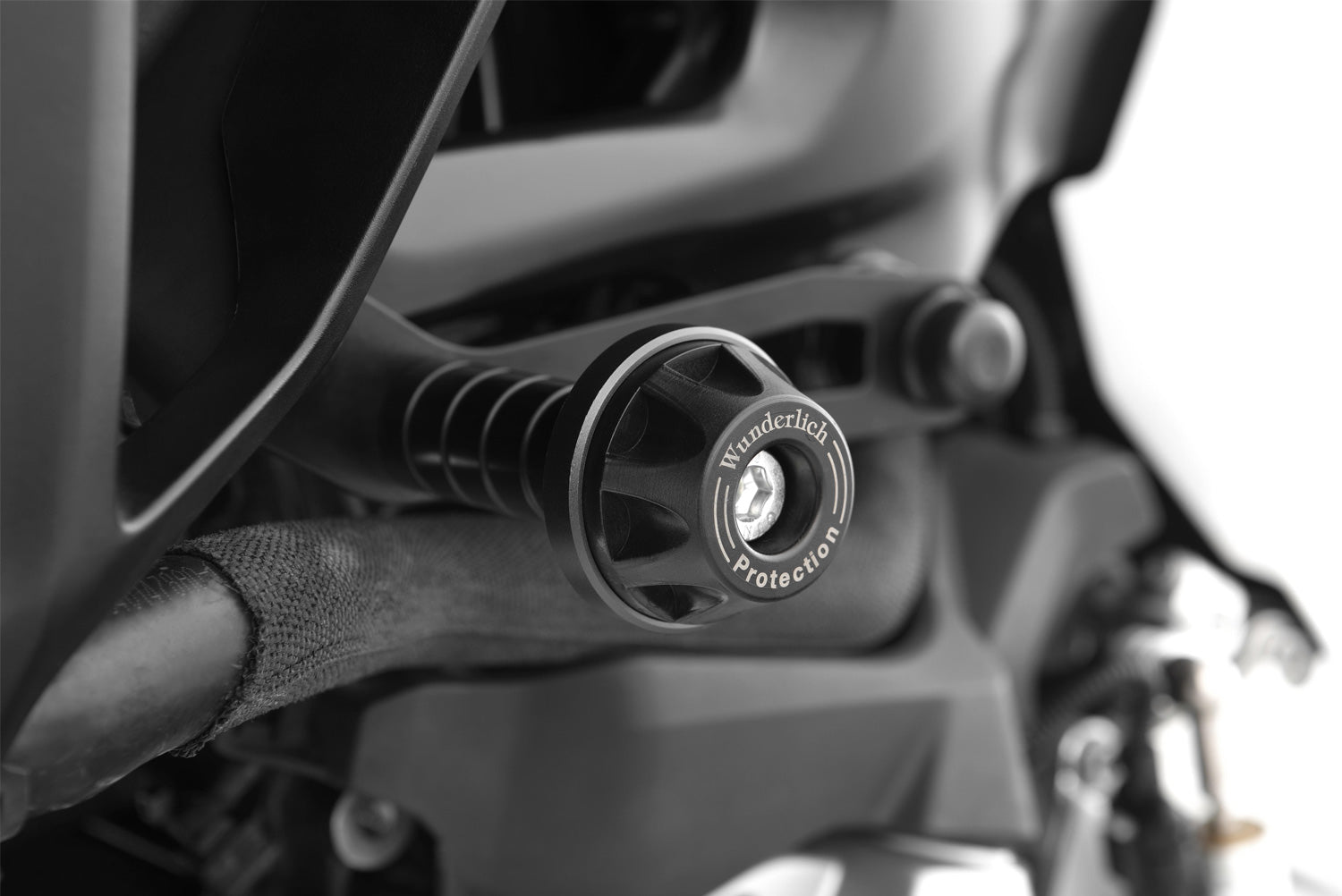 Effective protection for engine, frame and faring with a discreet look