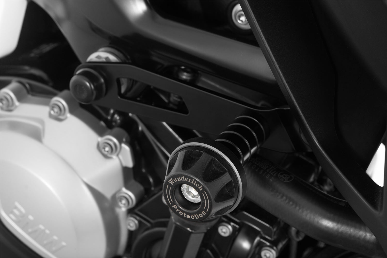 Effective protection for engine, frame and faring with a discreet look