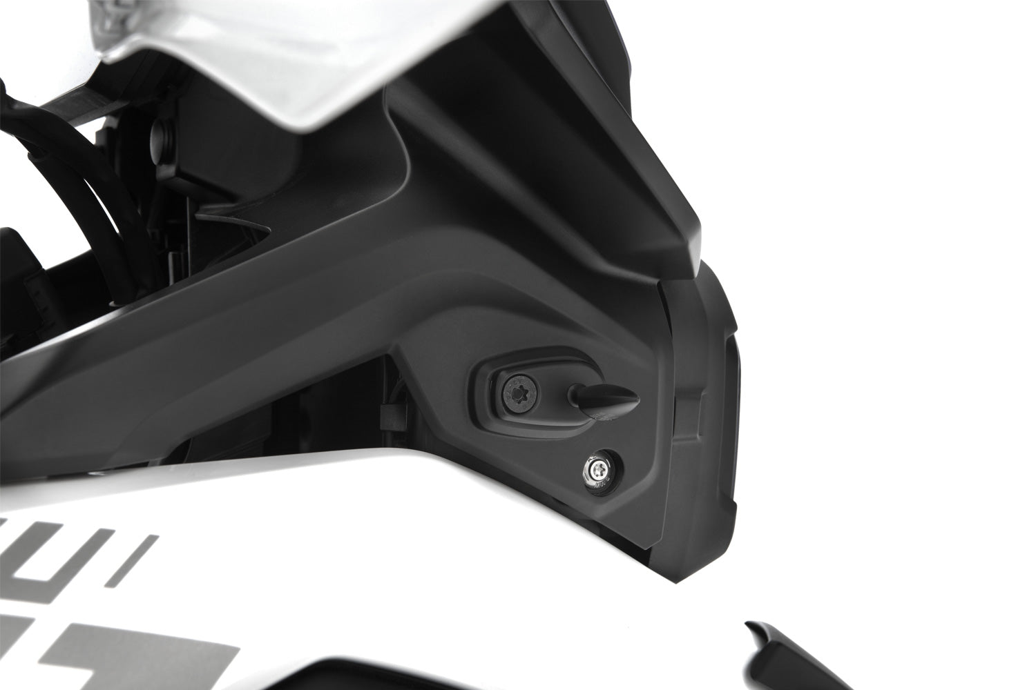 This adapter covers the opening on the original indicator bracket and simultaneously lets you attach accessory indicators.