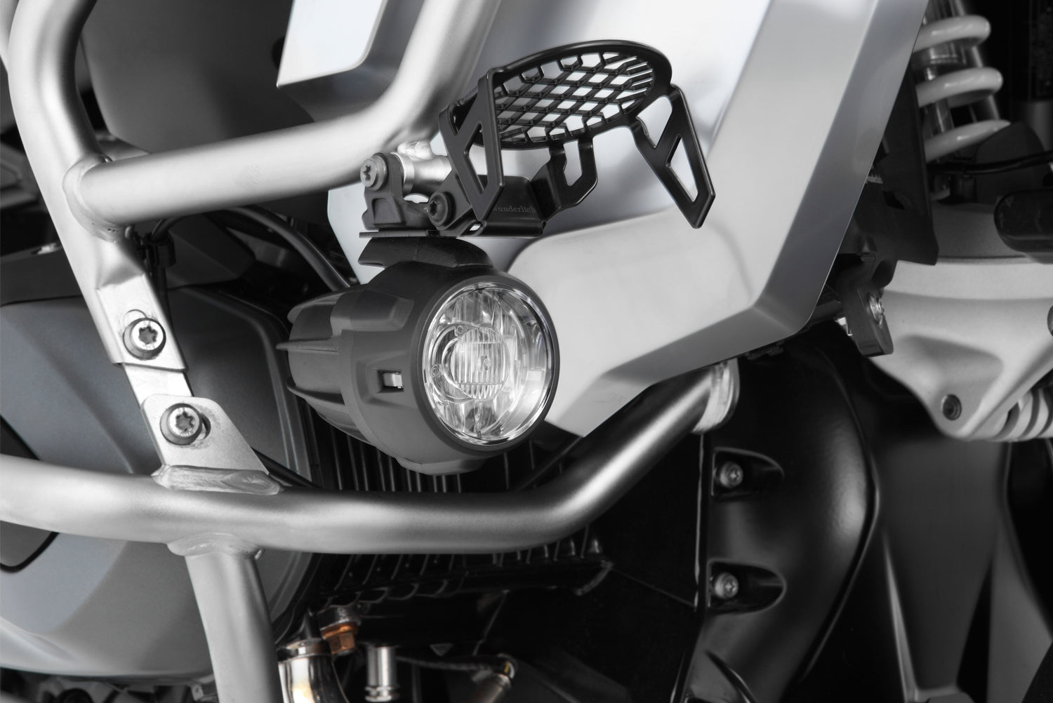 Wunderlich auxiliary light protection grille for BMW R 1200 GS LC  protects even from violent impacts.