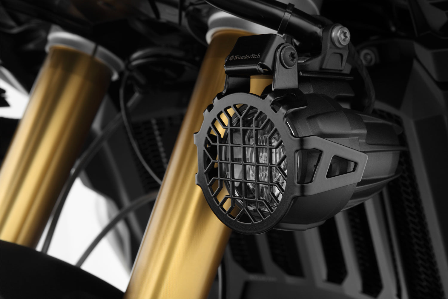 Wunderlich auxiliary light protection grille for BMW R 1200 GS LC  protects even from violent impacts.