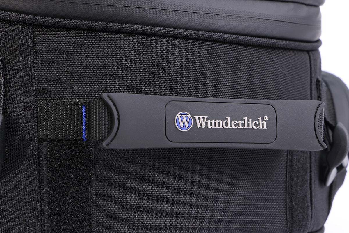 Multifunctional compact bag for the seat or luggage carrier