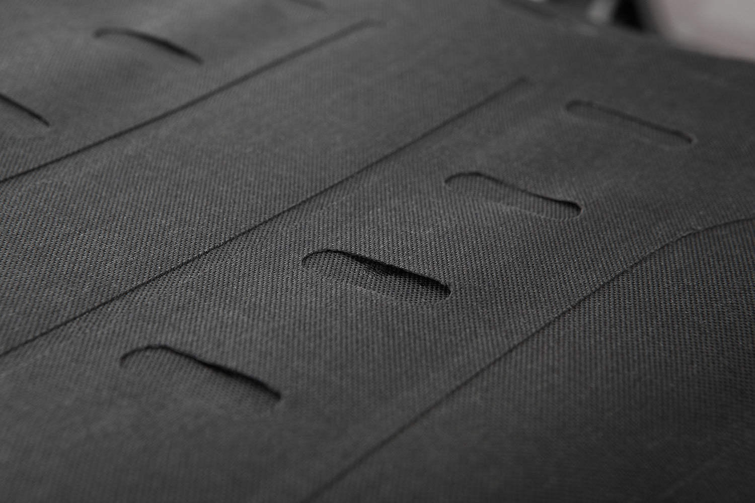 Multi-functional and compact bag can  either be attached to the luggage carrier of the passenger seat quickly and  simply
