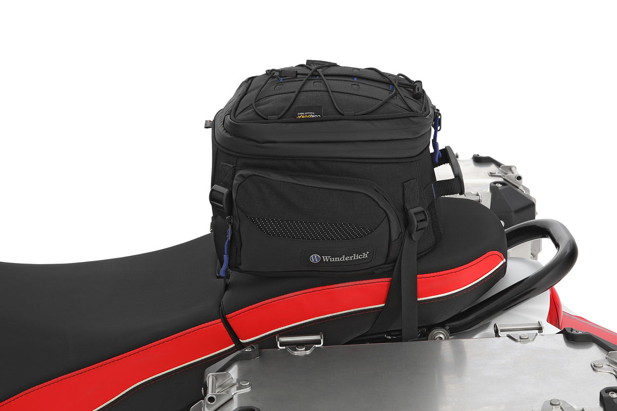 Multifunctional compact bag for the seat or luggage carrier