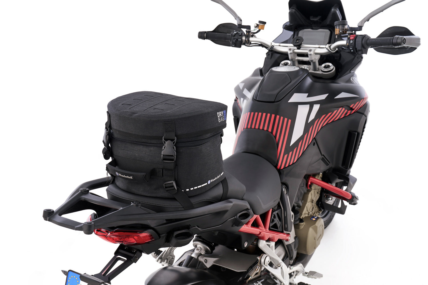 Multi-functional and compact bag can  either be attached to the luggage carrier of the passenger seat quickly and  simply