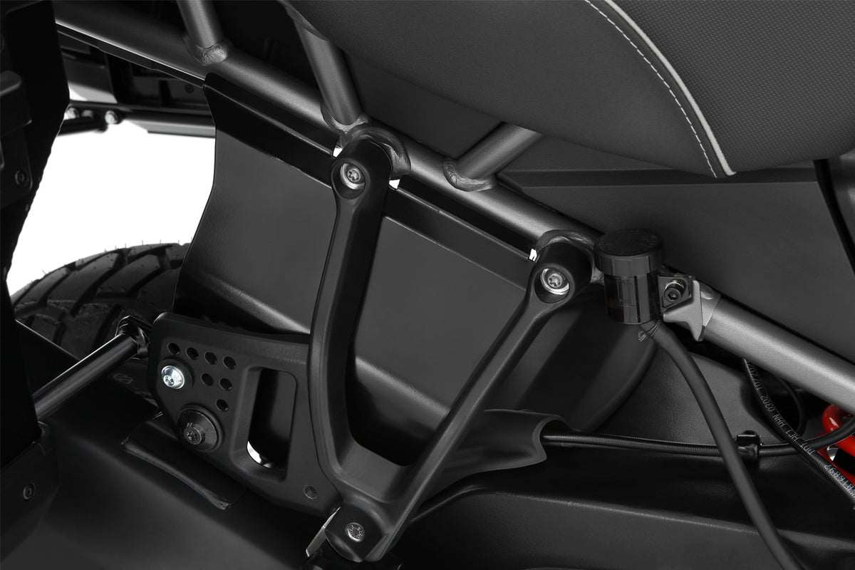Reliably protects pillion rider's legs and feet from swirling spray and road debris on rainy rides, increasing comfort