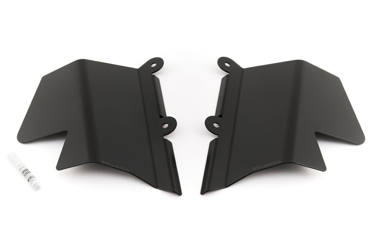 Reliably protects pillion rider's legs and feet from swirling spray and road debris on rainy rides, increasing comfort
