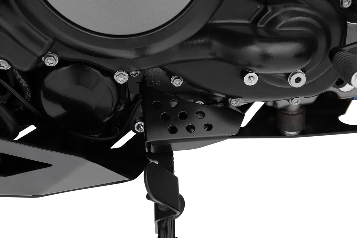 Solid all-round protection for the exposed ignition interruption switch on the side stand.