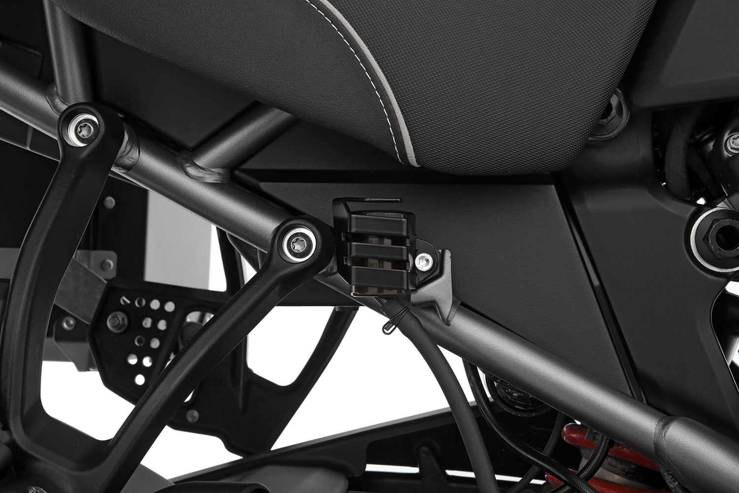 Discreetly integrated protective cover for the rear wheel brake fluid reservoir